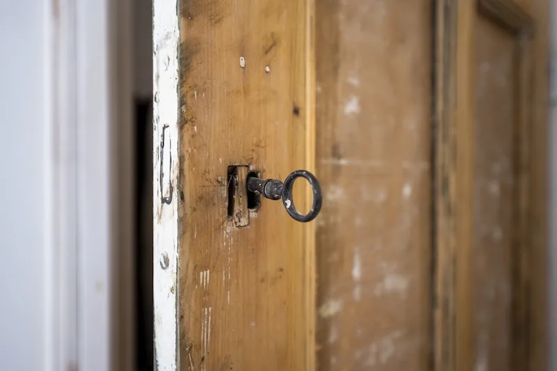 old door with lock and key